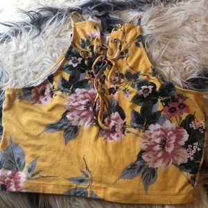 Yellow crop top with floral designs